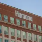 View of the Humana building with prominent signage, representing healthcare and insurance services related to Medicare and legal issues.
