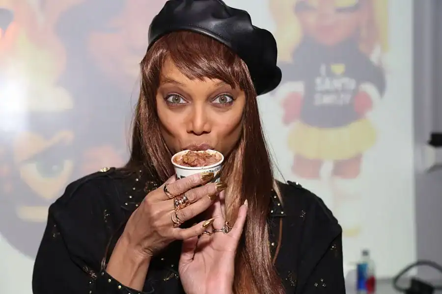 Tyra Banks holding and eating ice cream, related to the Tyra Banks ICE Cream Lawsuit case.