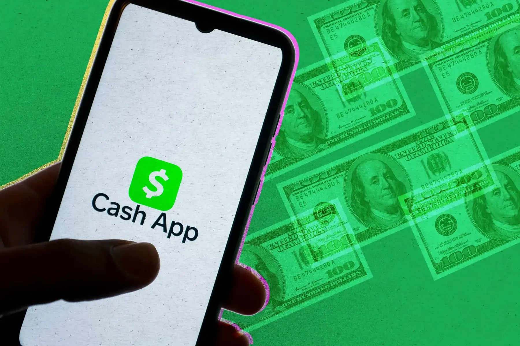 Image showing a smartphone with the Cash App logo and fake money, highlighting issues related to Cash App scam texts and legal actions.