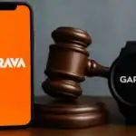 Image showing a smartphone with the Strava app logo, a gavel, and a Garmin smartwatch, symbolizing a legal dispute involving fitness tracking companies.