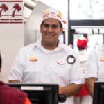 Elijah Obeng smiling at In-N-Out Burger, involved in a legal case.