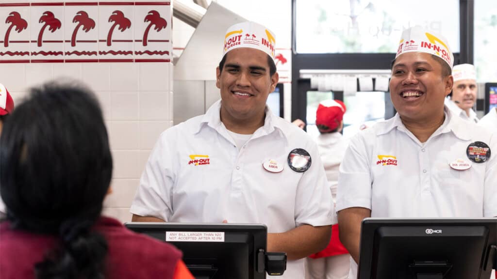 Elijah Obeng smiling at In-N-Out Burger, involved in a legal case.
