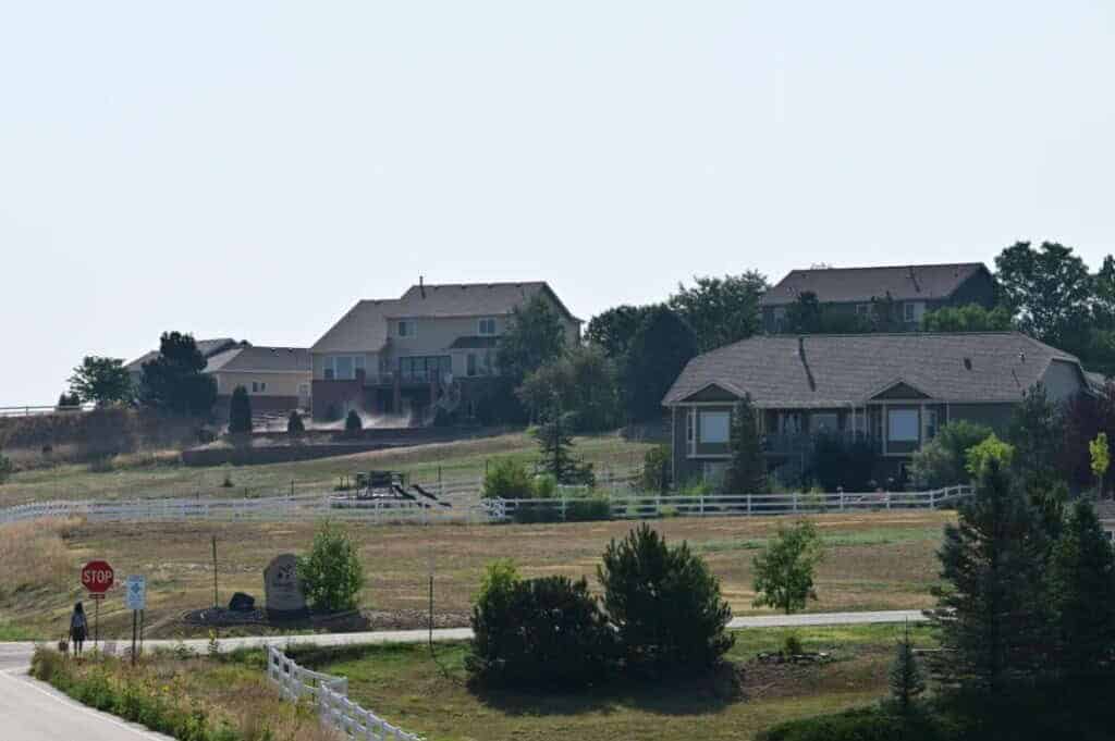 An image depicting residential homes in Todd Creek Farms, relevant to legal issues involving the HOA.